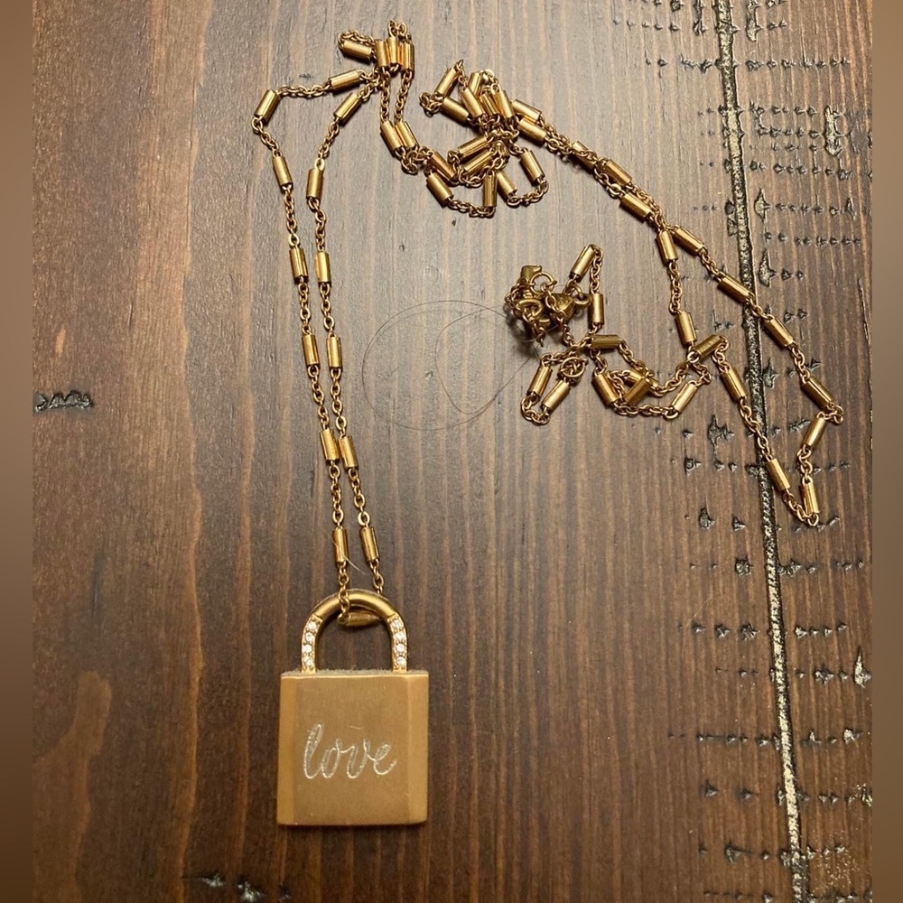 Keep Collective lock necklace